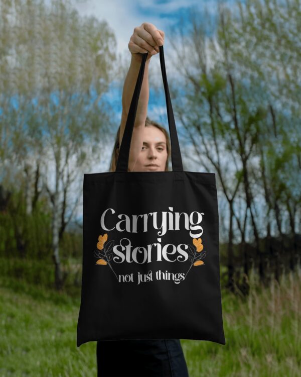 Black Carrying Stories Tote Bag